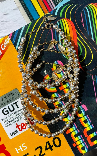 14k Gold Two-Tone Beaded Bracelets